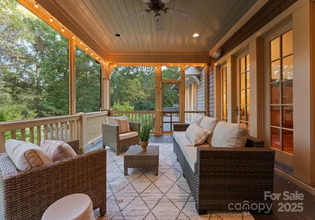 a view of balcony with wooden floor