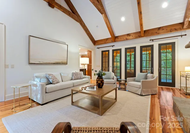 a bedroom with a bed and a view of bedroom