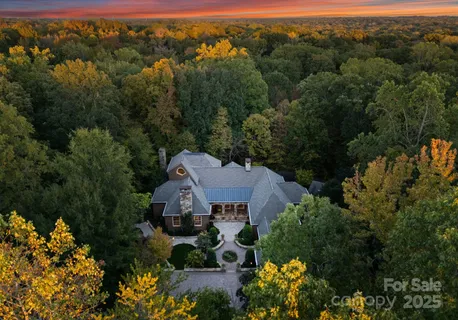 an aerial view of a house with a garden