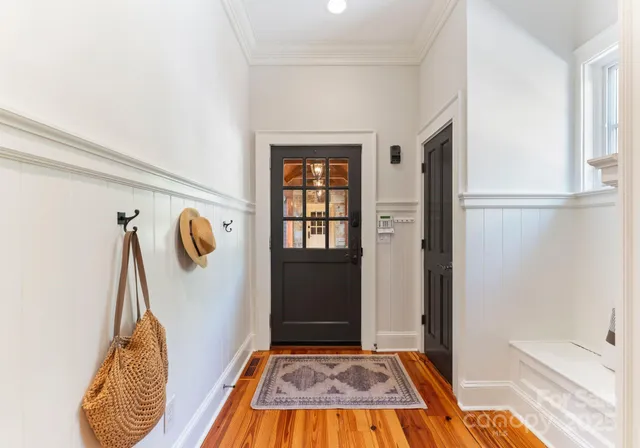 a lobby with furniture and window