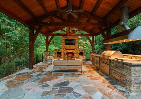 a view of a kitchen with a sink and a stove