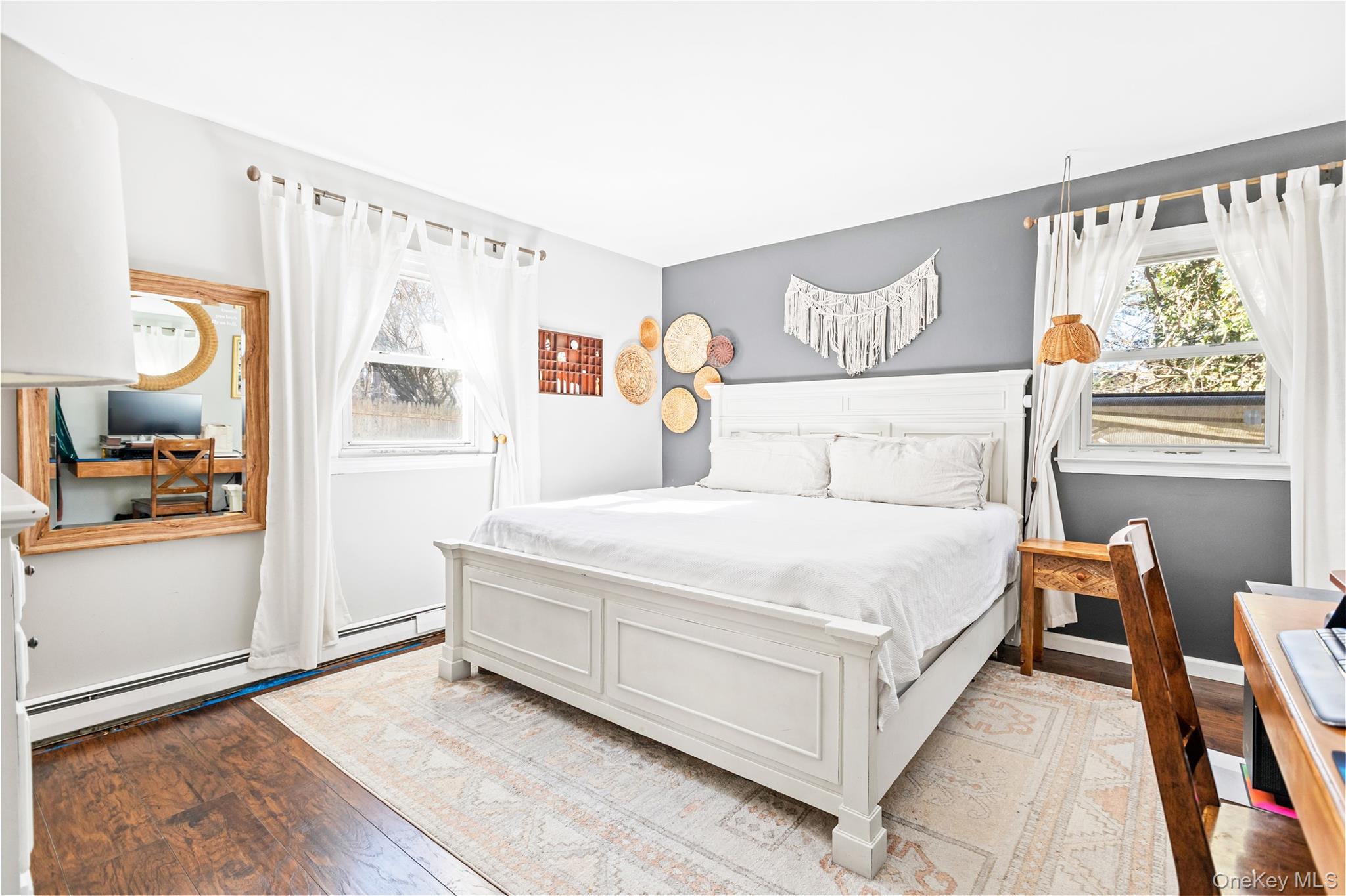 193 Maple Road Wading River, NY 11792 - Photo 13 of 17 a bedroom with a bed and a window