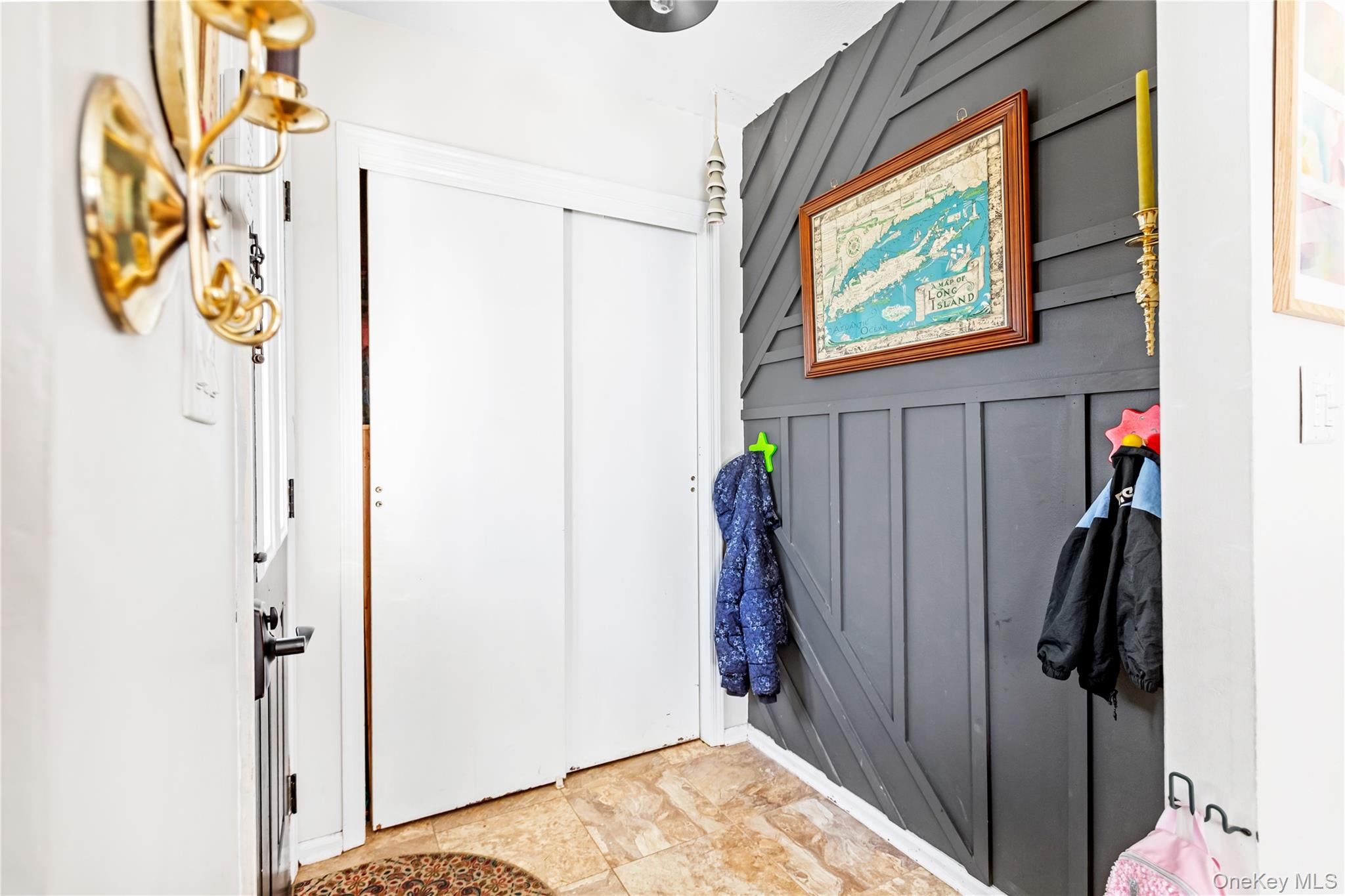 193 Maple Road Wading River, NY 11792 - Photo 6 of 17 a view of walk in closet with clothes and shoes