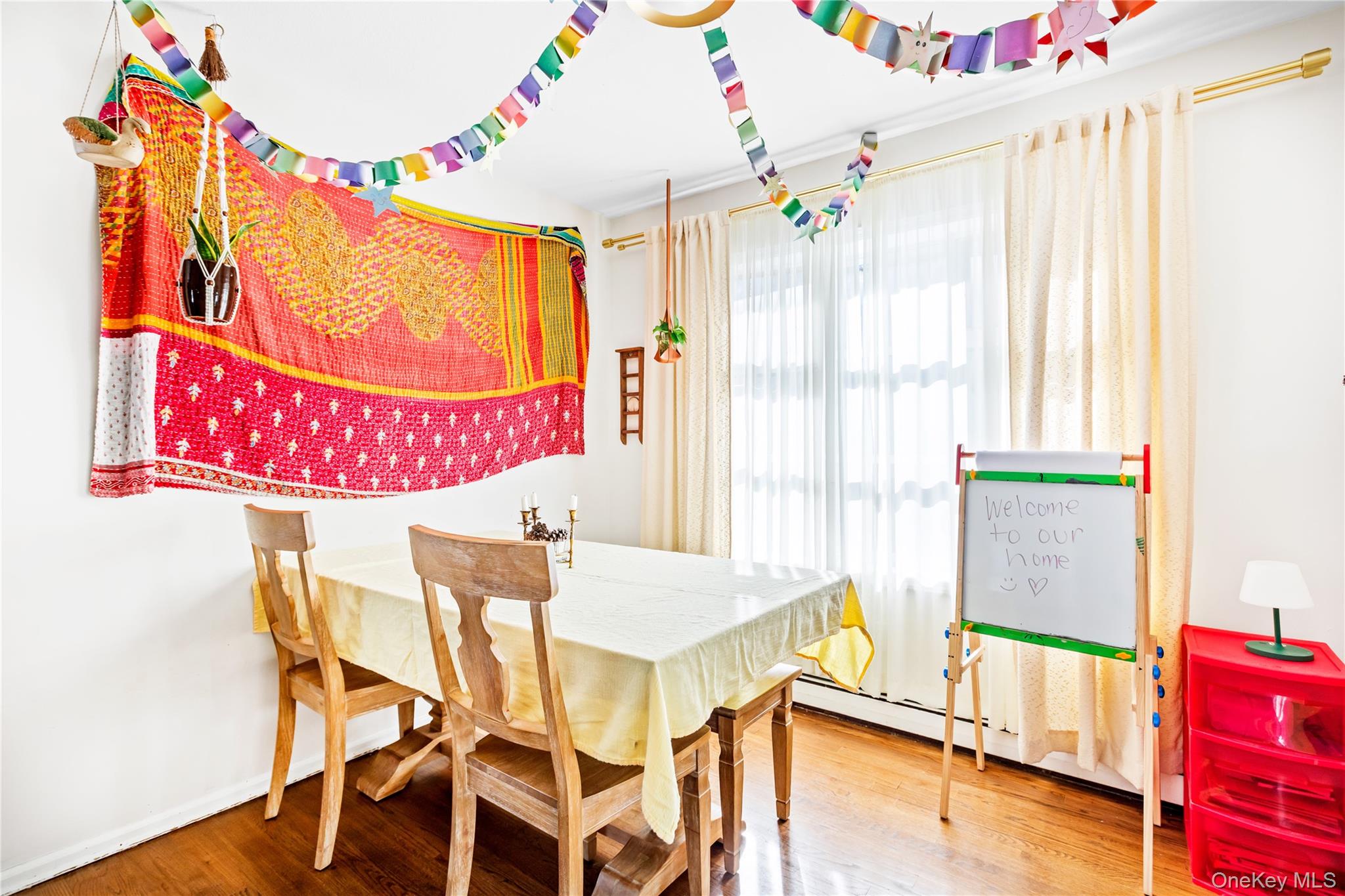 193 Maple Road Wading River, NY 11792 - Photo 7 of 17 a bedroom with a bed and window
