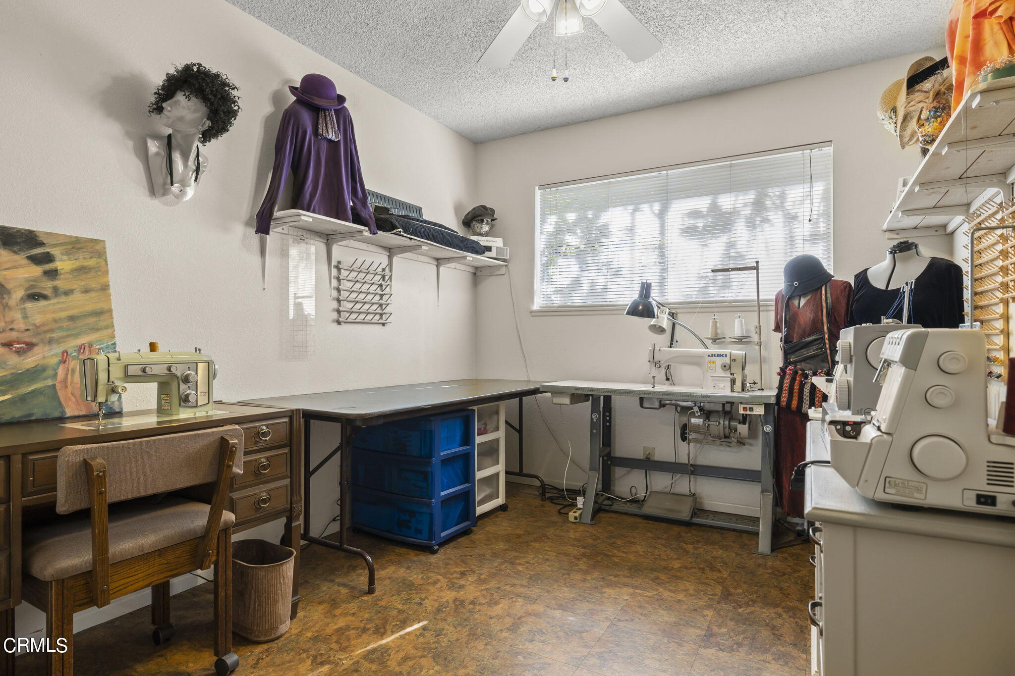 2072 Olga Street Oxnard, CA 93036 - Photo 11 of 18 a room with a chair and white walls