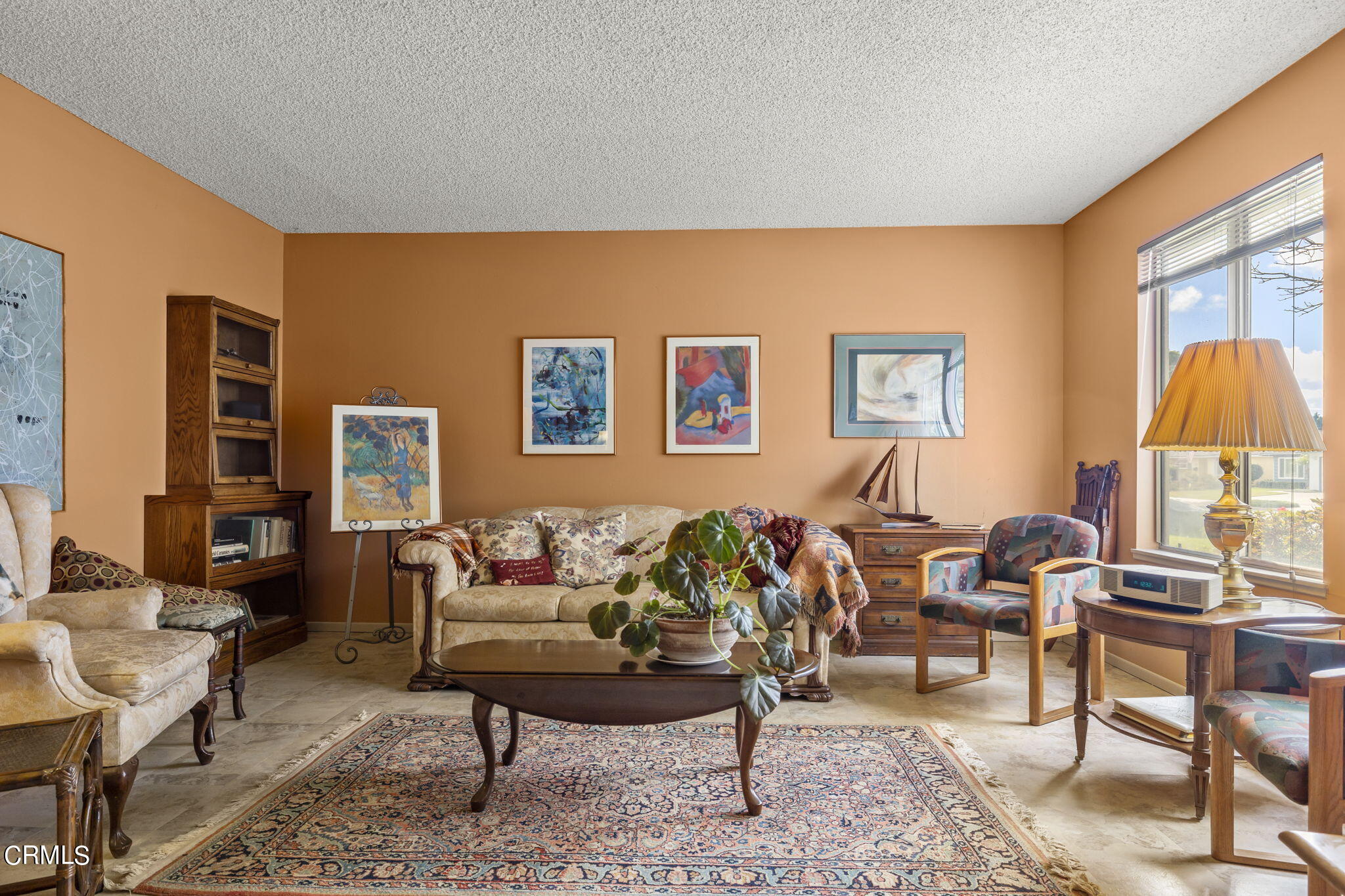 2072 Olga Street Oxnard, CA 93036 - Photo 3 of 18 a living room with furniture wooden floor and a window