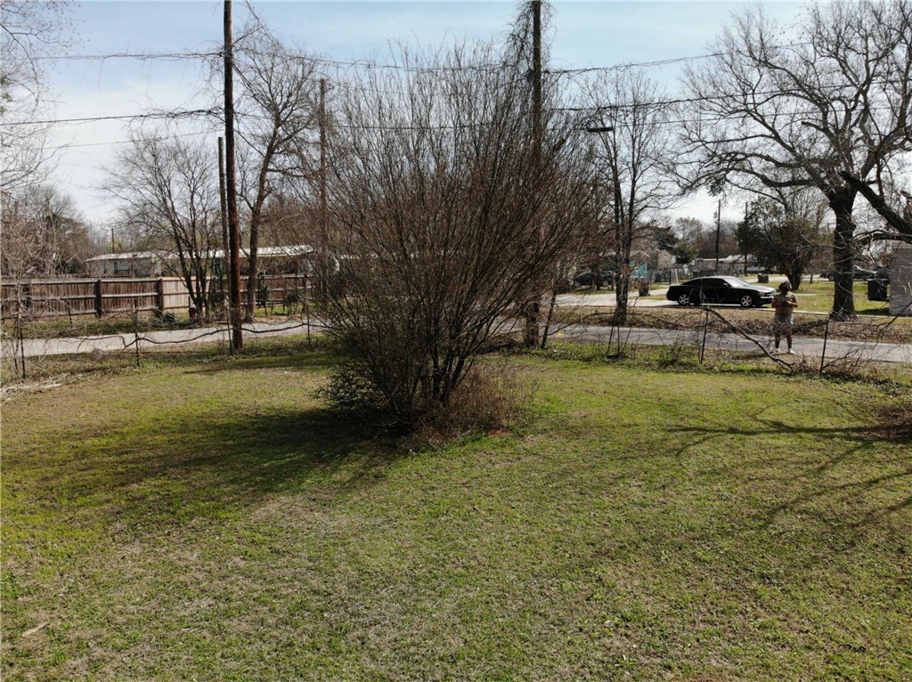 1001 Hunters Lane Bryan, TX 77803 - Photo 14 of 23 a view of a yard with a fountain