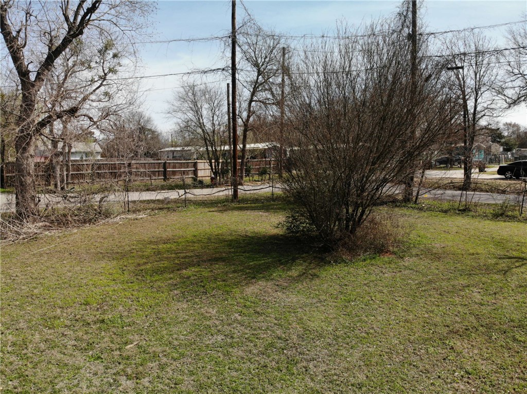 1001 Hunters Lane Bryan, TX 77803 - Photo 15 of 23 a view of a yard with large trees