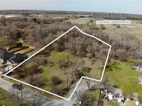 an aerial view of residential house with parking space