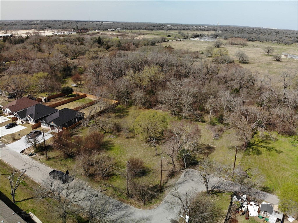 1001 Hunters Lane Bryan, TX 77803 - Photo 23 of 23 a view of outdoor space and covered with trees