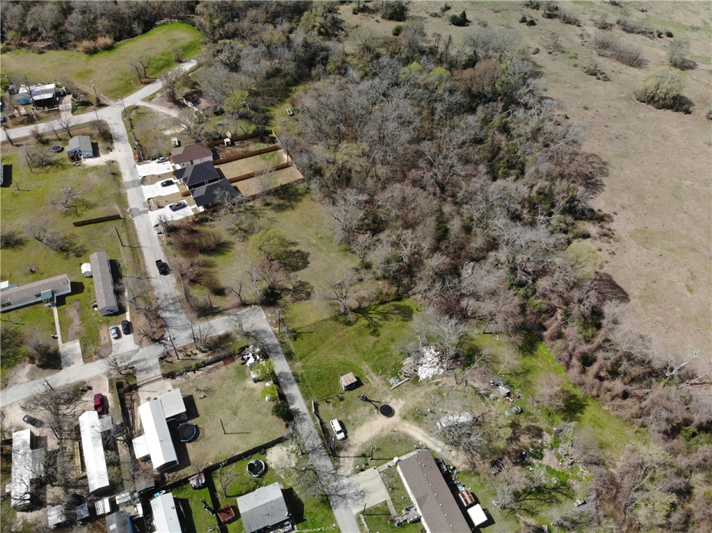 1001 Hunters Lane Bryan, TX 77803 - Photo 3 of 23 an aerial view of residential house with parking space