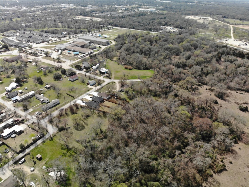 1001 Hunters Lane Bryan, TX 77803 - Photo 6 of 23 an aerial view of residential houses with outdoor space