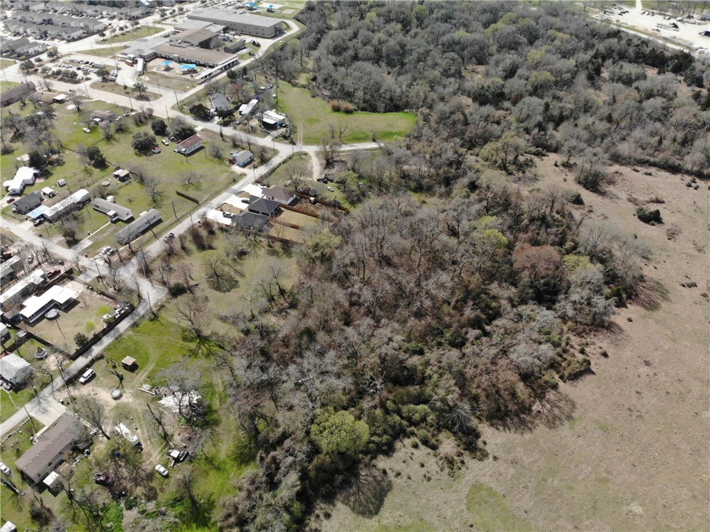1001 Hunters Lane Bryan, TX 77803 - Photo 8 of 23 a view of a city with green field