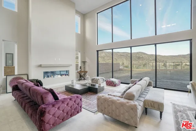 a kitchen with stainless steel appliances kitchen island granite countertop a sink and cabinets