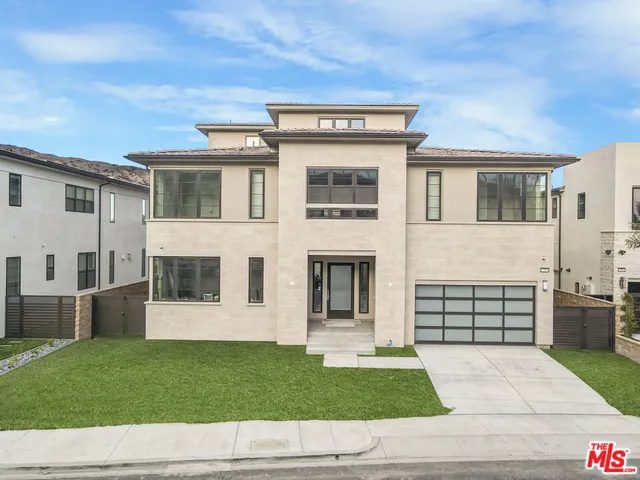 a view of a workspace with furniture