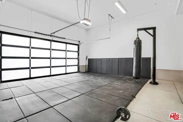 an aerial view of a house with a garden