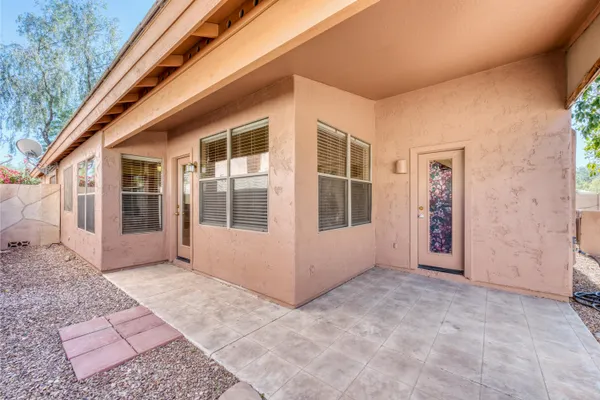 a view of front door and yard