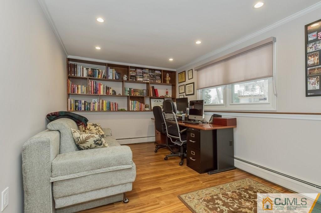 53 Lynnwood Road Edison, NJ 08820 - Photo 13 of 19 a living room with furniture window and wooden floor
