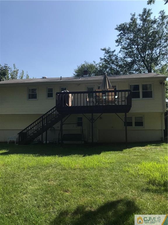 53 Lynnwood Road Edison, NJ 08820 - Photo 17 of 19 a view of a terrace with a garden