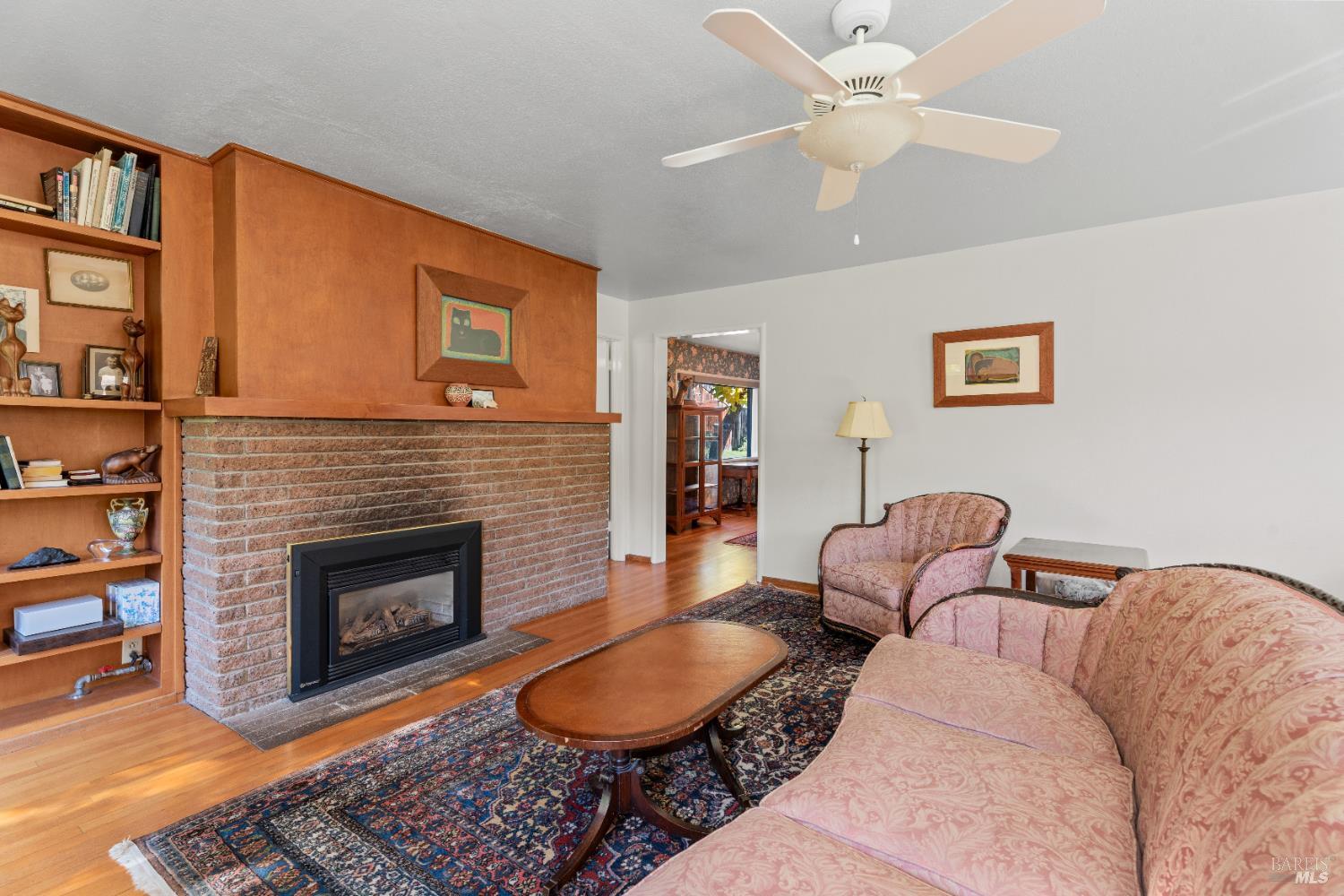 7420 Eastside Potter Valley Road Ukiah, CA 95482 - Photo 12 of 47 Formal living room leads into formal dining room and den.