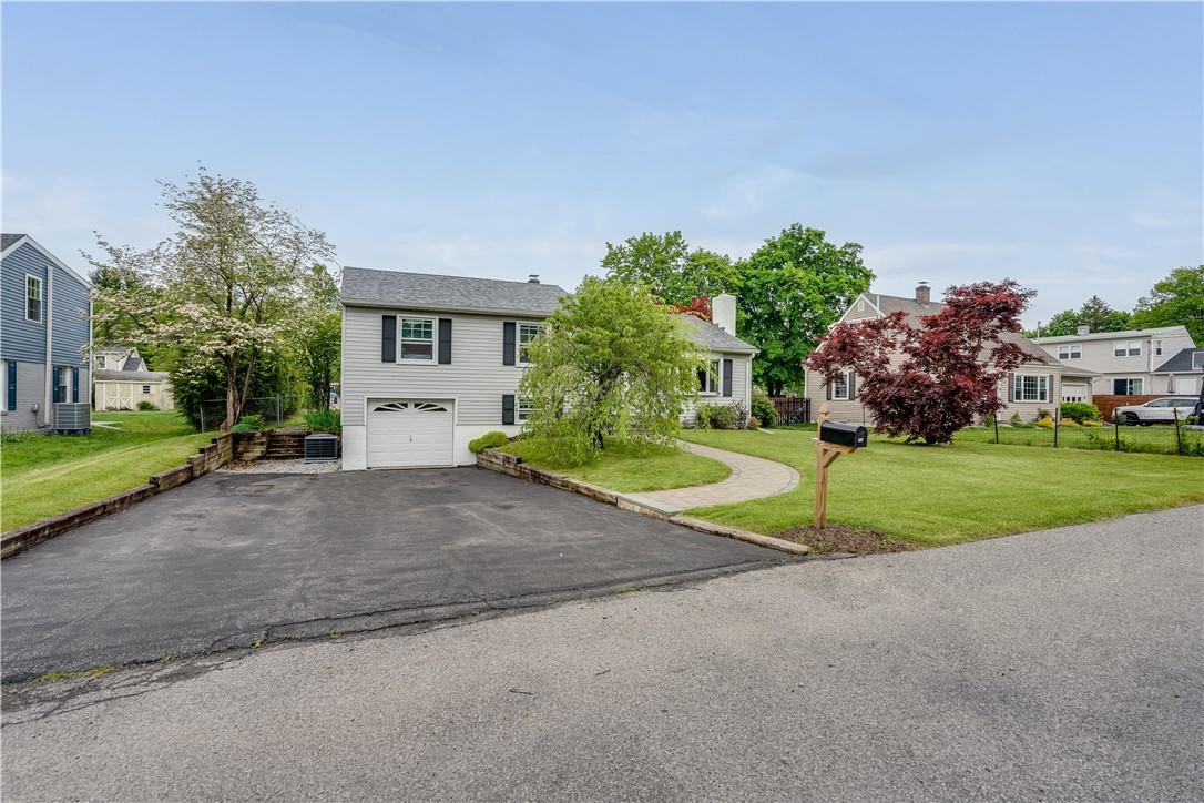 11 Jane Street Poughkeepsie, NY 12603 - Photo 1 of 1 a view of a house with a big yard and palm trees