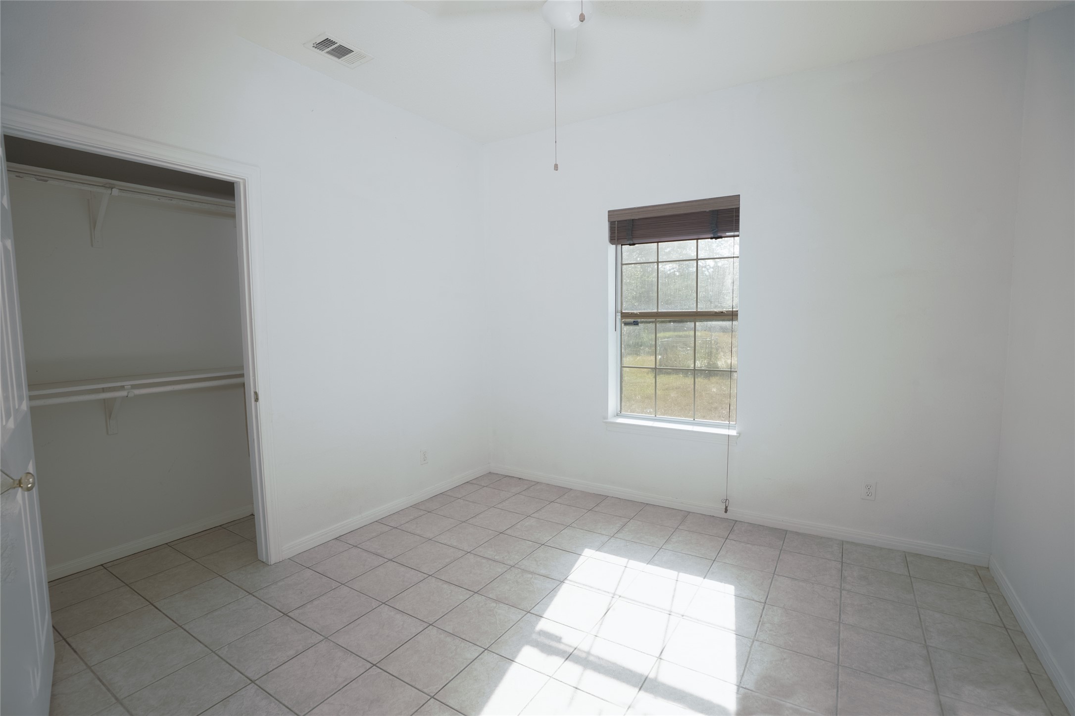 1751 County Road 255 Georgetown, TX 78633 - Photo 9 of 29 a view of an empty room with a window