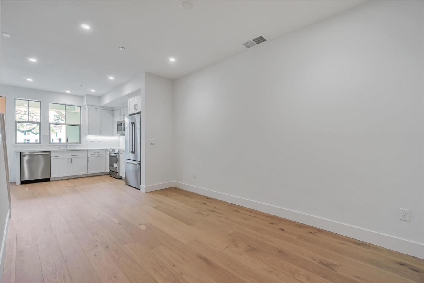 230 Oak Circle Walnut Creek, CA 94597 - Photo 11 of 22 a view of a kitchen with a sink and a large window