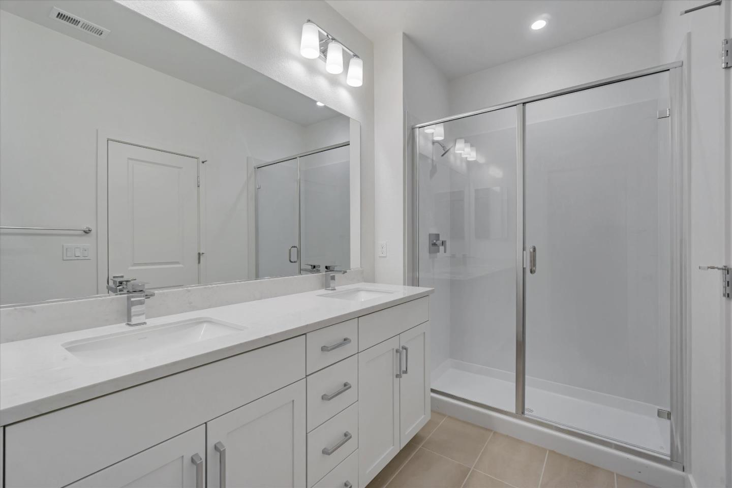 230 Oak Circle Walnut Creek, CA 94597 - Photo 16 of 22 a bathroom with a shower sink and mirror