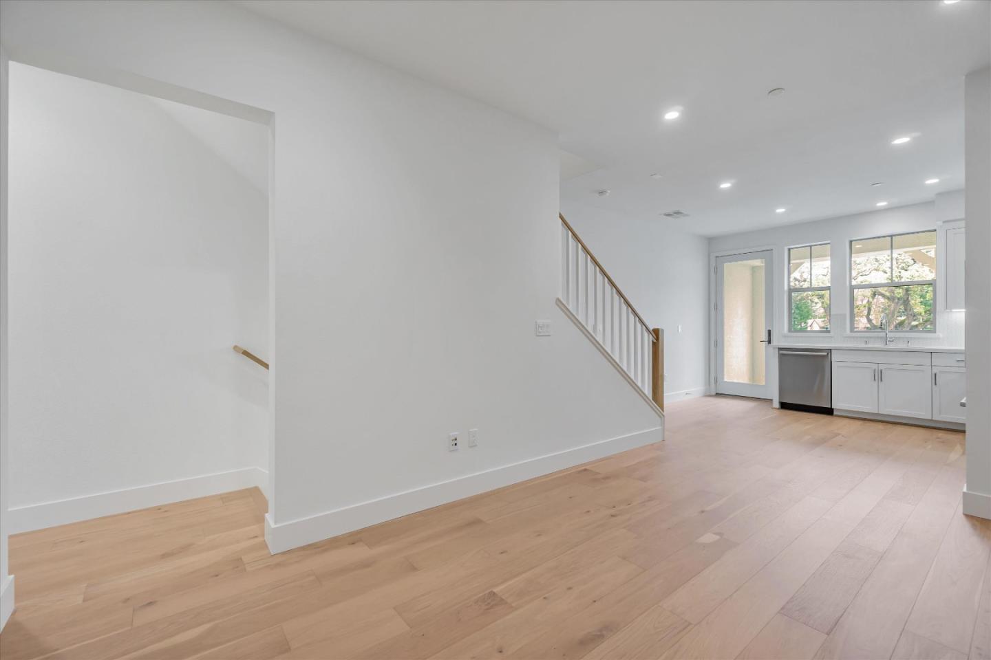230 Oak Circle Walnut Creek, CA 94597 - Photo 10 of 22 a view of an empty room with a window and wooden floor