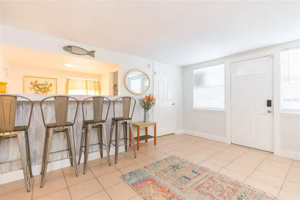 a room with a fireplace and a table