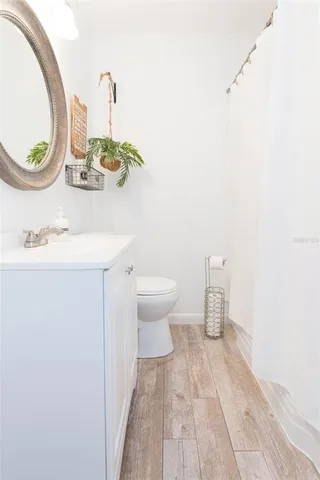 a view of a hallway with a white walls