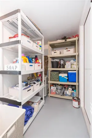 a view of a dining room with furniture and window