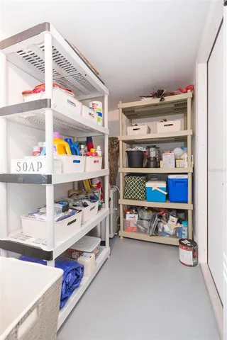 a view of a dining room with furniture and window