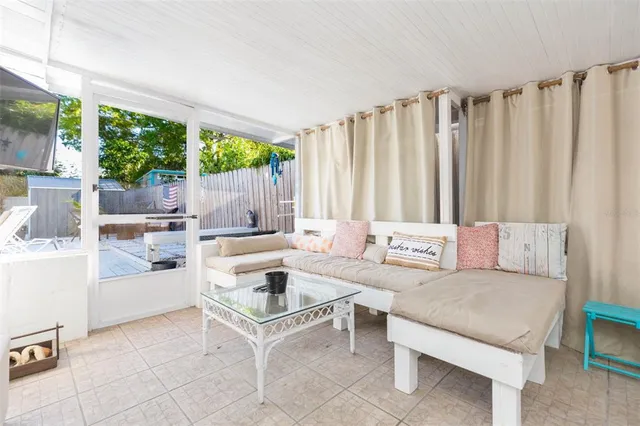 a view of swimming pool with a yard and seating space