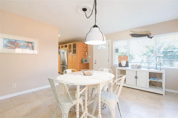 a bedroom with furniture and a chandelier