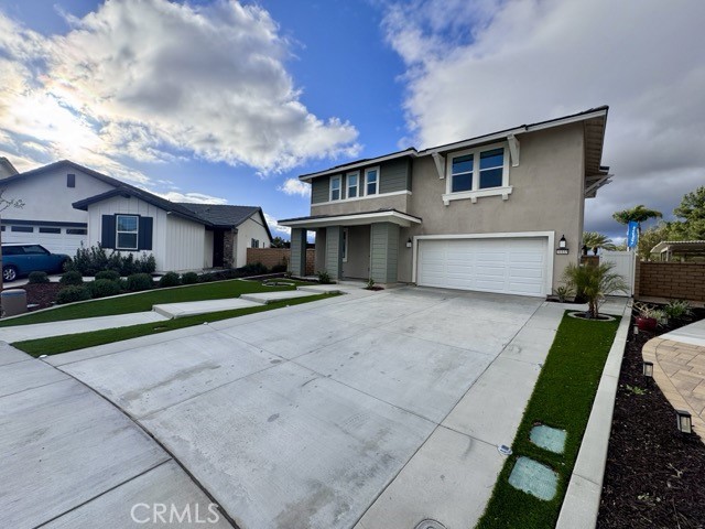 30115 Adrift Lane Menifee, CA 92584 - Photo 3 of 60 a front view of house with yard and green space