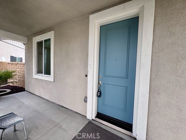 30115 Adrift Lane Menifee, CA 92584 - Photo 4 of 60 a view of an entryway door