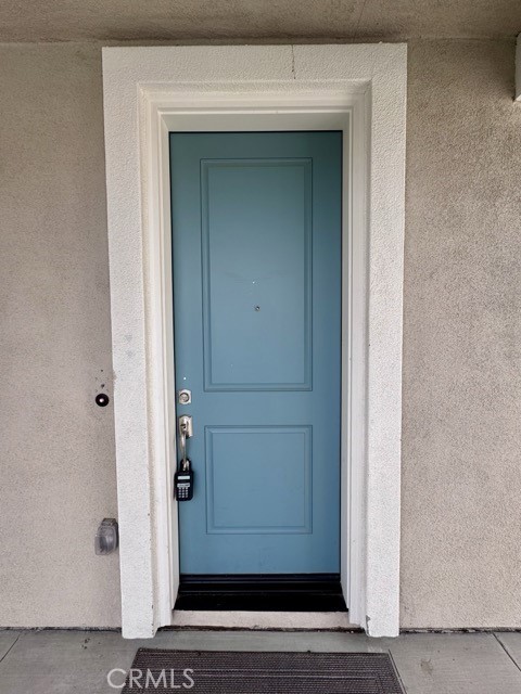 30115 Adrift Lane Menifee, CA 92584 - Photo 6 of 60 a view of a wooden door