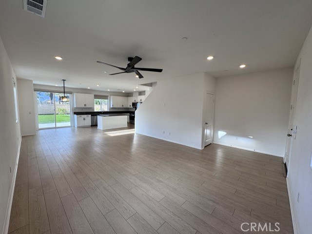 30115 Adrift Lane Menifee, CA 92584 - Photo 8 of 60 a view of a kitchen with a sink and a refrigerator
