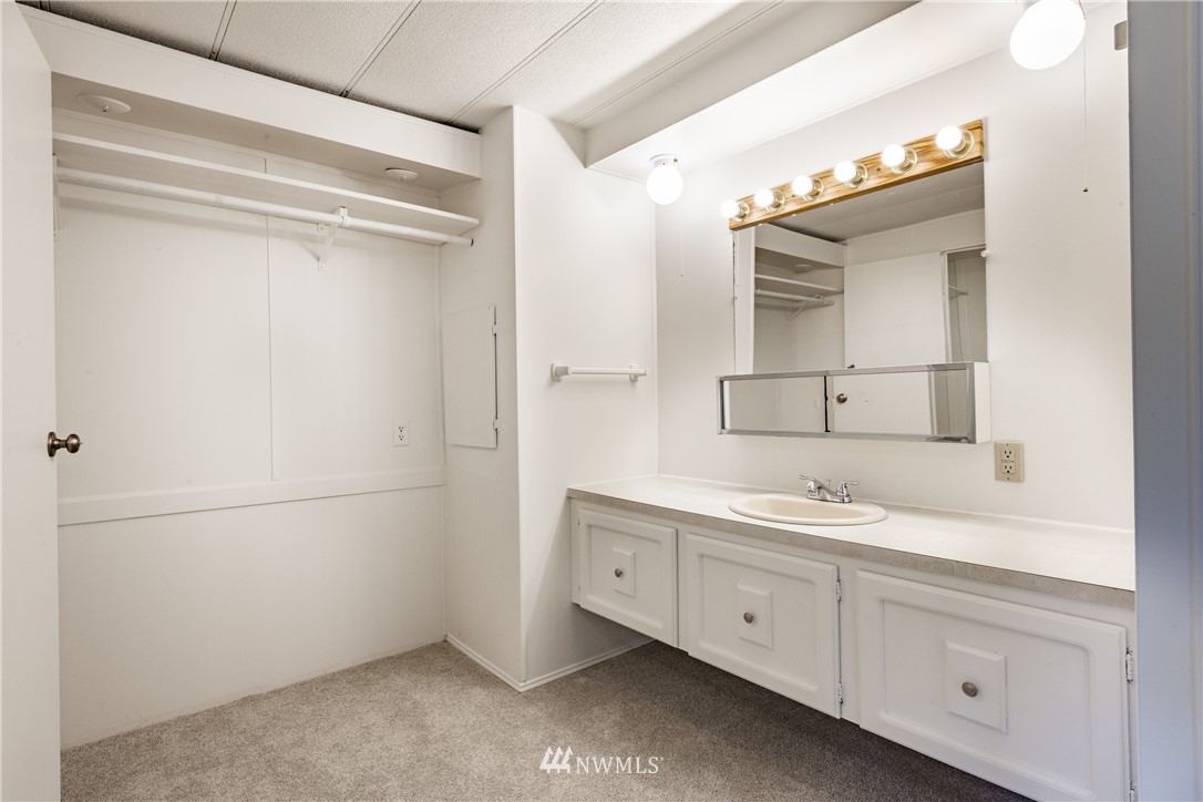 3177 Creasey Road Custer, WA 98240 - Photo 17 of 38 a spacious bathroom with a double vanity sink and mirror