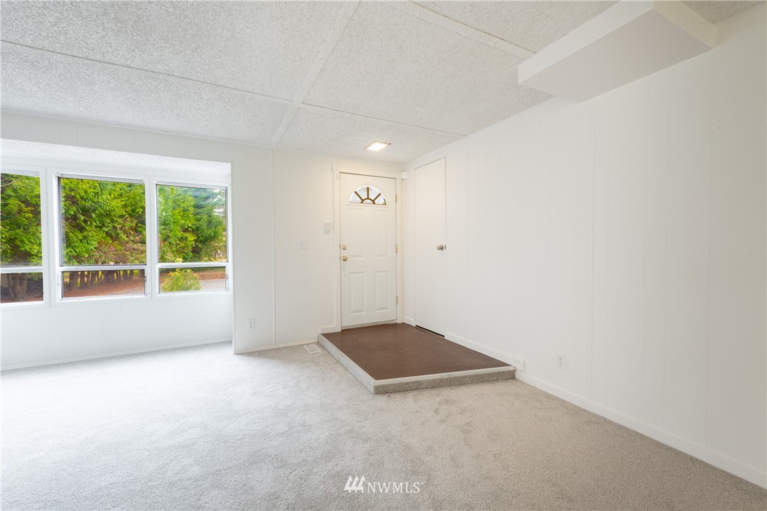 3177 Creasey Road Custer, WA 98240 - Photo 3 of 38 a view of an empty room with a window