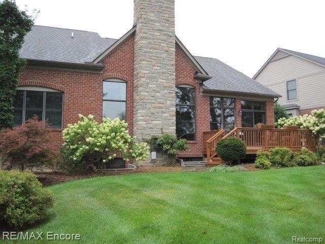 4647 Oakhurst Ridge Road, Unit 242 Clarkston, MI 48348 - Photo 23 of 25 Rear Elevation