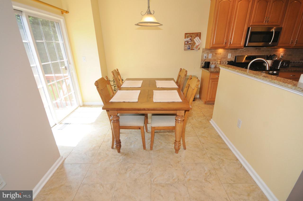 349 Huntington Drive Delran, NJ 08075 - Photo 11 of 68 a dining room with furniture and a window