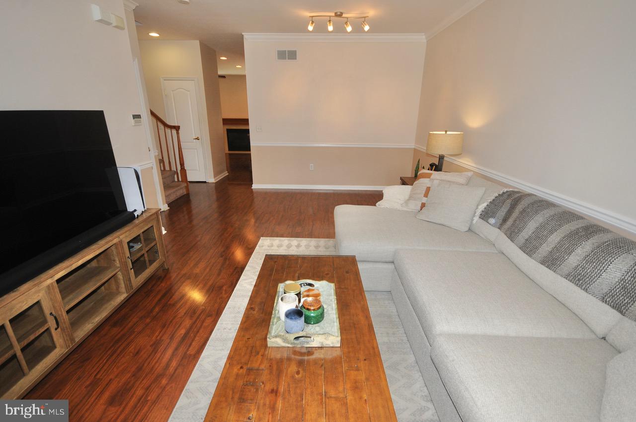 349 Huntington Drive Delran, NJ 08075 - Photo 13 of 68 a bath room with a bed and a flat screen tv