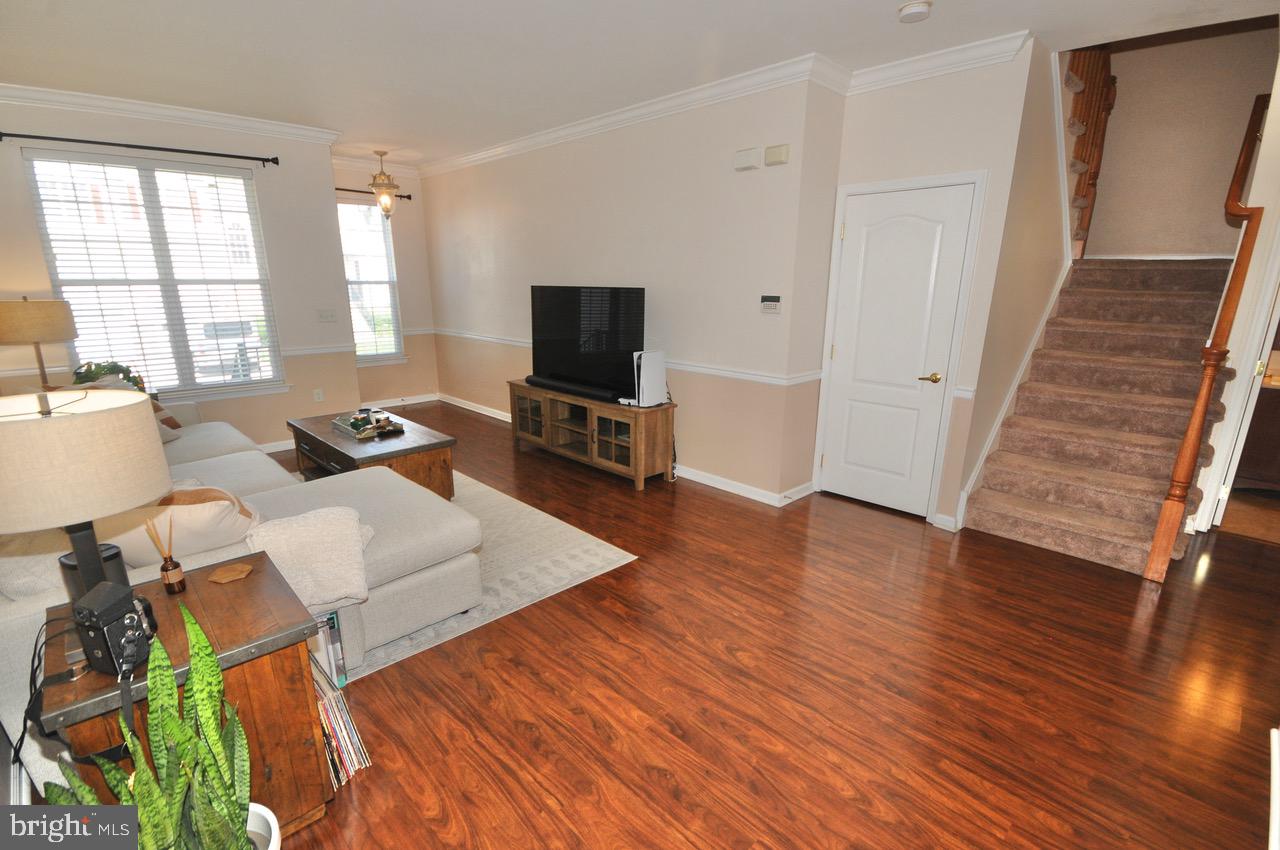 349 Huntington Drive Delran, NJ 08075 - Photo 15 of 68 a living room with furniture and a flat screen tv