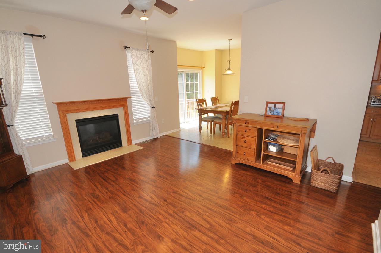 349 Huntington Drive Delran, NJ 08075 - Photo 17 of 68 a view of a livingroom with furniture and a fireplace