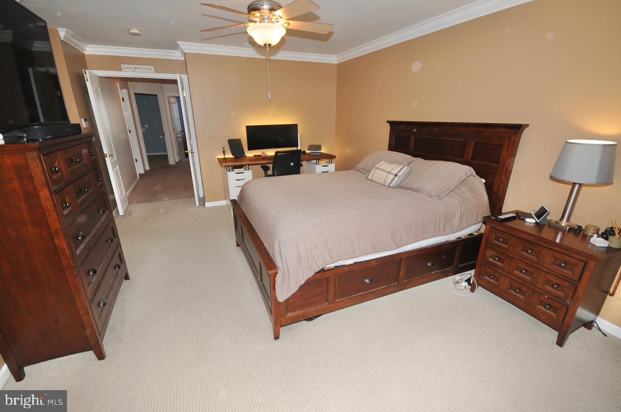 349 Huntington Drive Delran, NJ 08075 - Photo 21 of 68 a bed room with a bed and a television