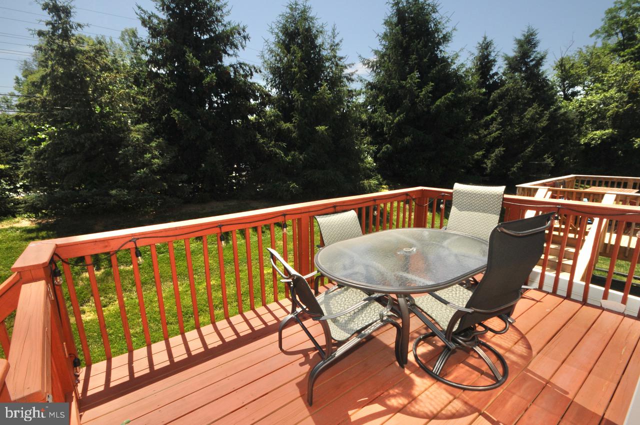 349 Huntington Drive Delran, NJ 08075 - Photo 39 of 68 a view of balcony with wooden floor and outdoor seating
