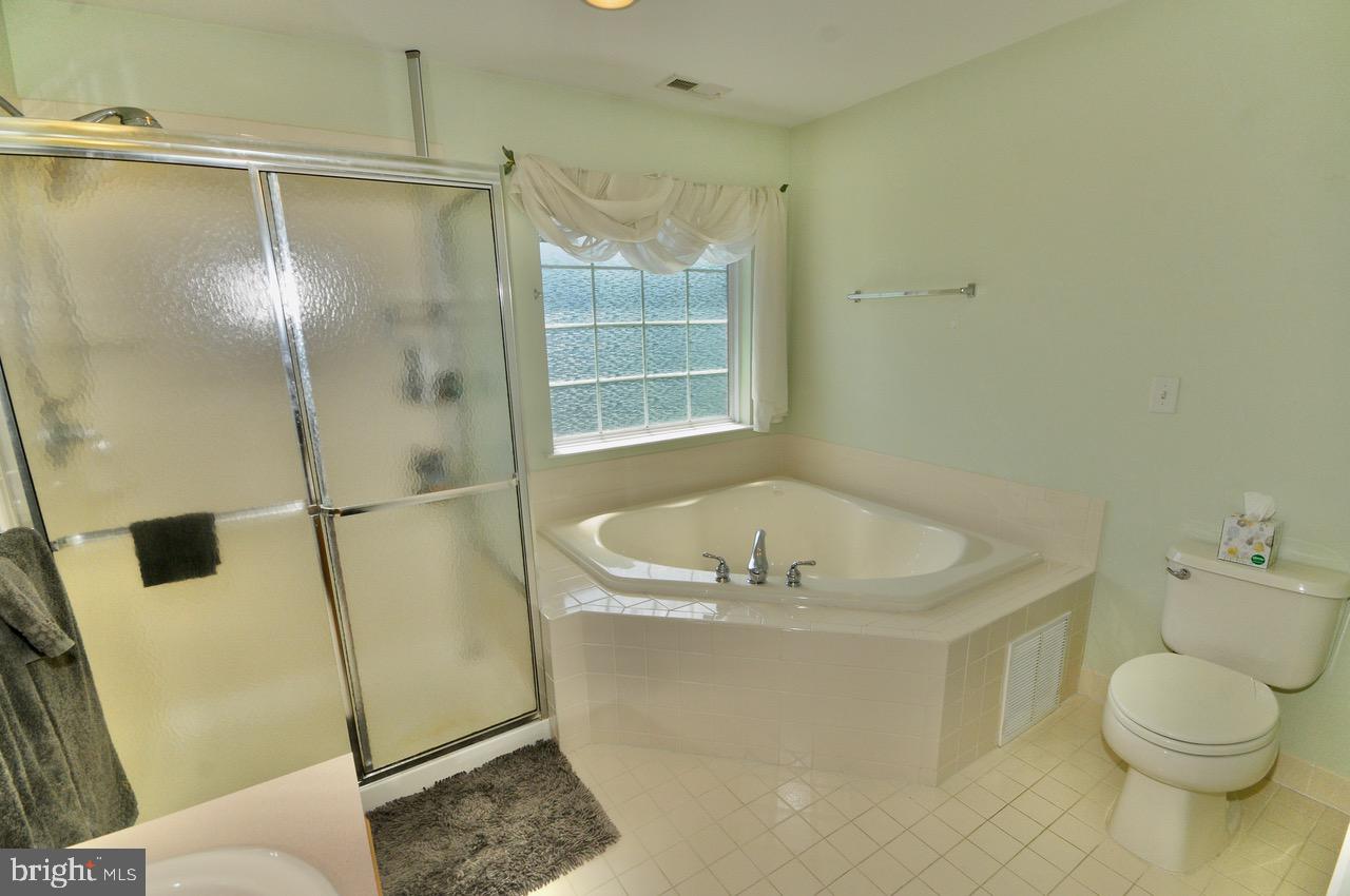 349 Huntington Drive Delran, NJ 08075 - Photo 4 of 68 a bathroom with a sink toilet and shower