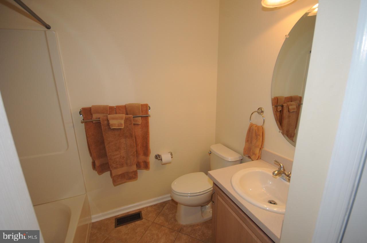 349 Huntington Drive Delran, NJ 08075 - Photo 48 of 68 a bathroom with a toilet and a sink